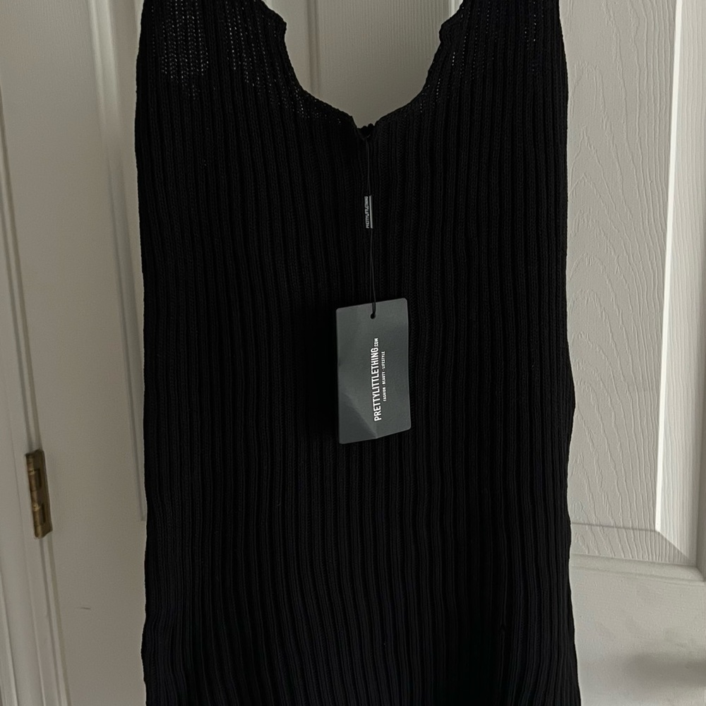 Plus size little black dress from Pretty Little thing. Stretchy material
